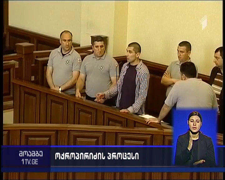 Giorgi Okropiridze being questioned