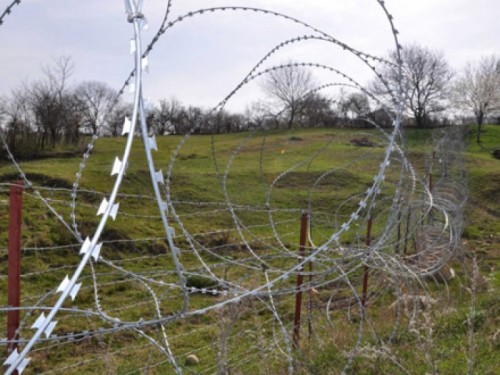 Occupational regime marks border with arable land at Karafila village
