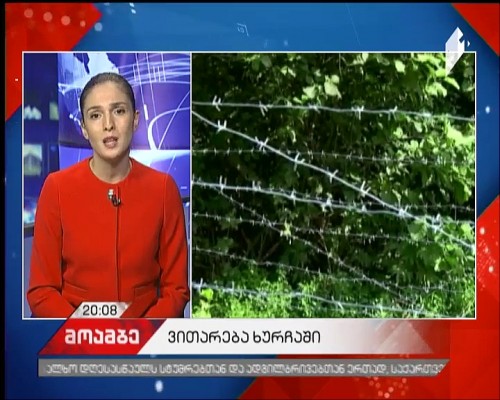 Russian soldiers install barbed wires in Khurcha village
