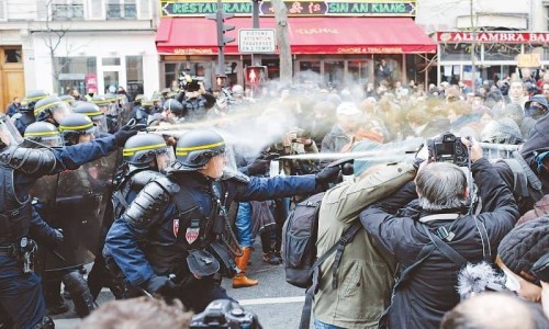 Thousands protest against Macron in France